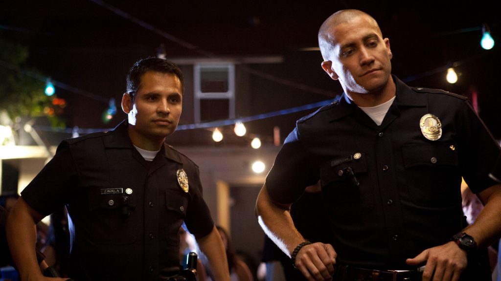 Jake Gyllenhaal and Michael Peña in End of Watch (2012)