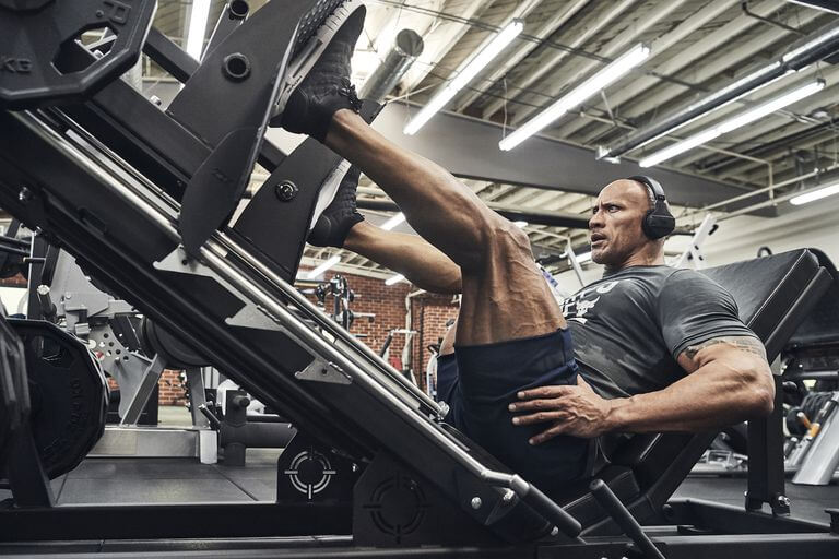 Dwayne Johnson working out.