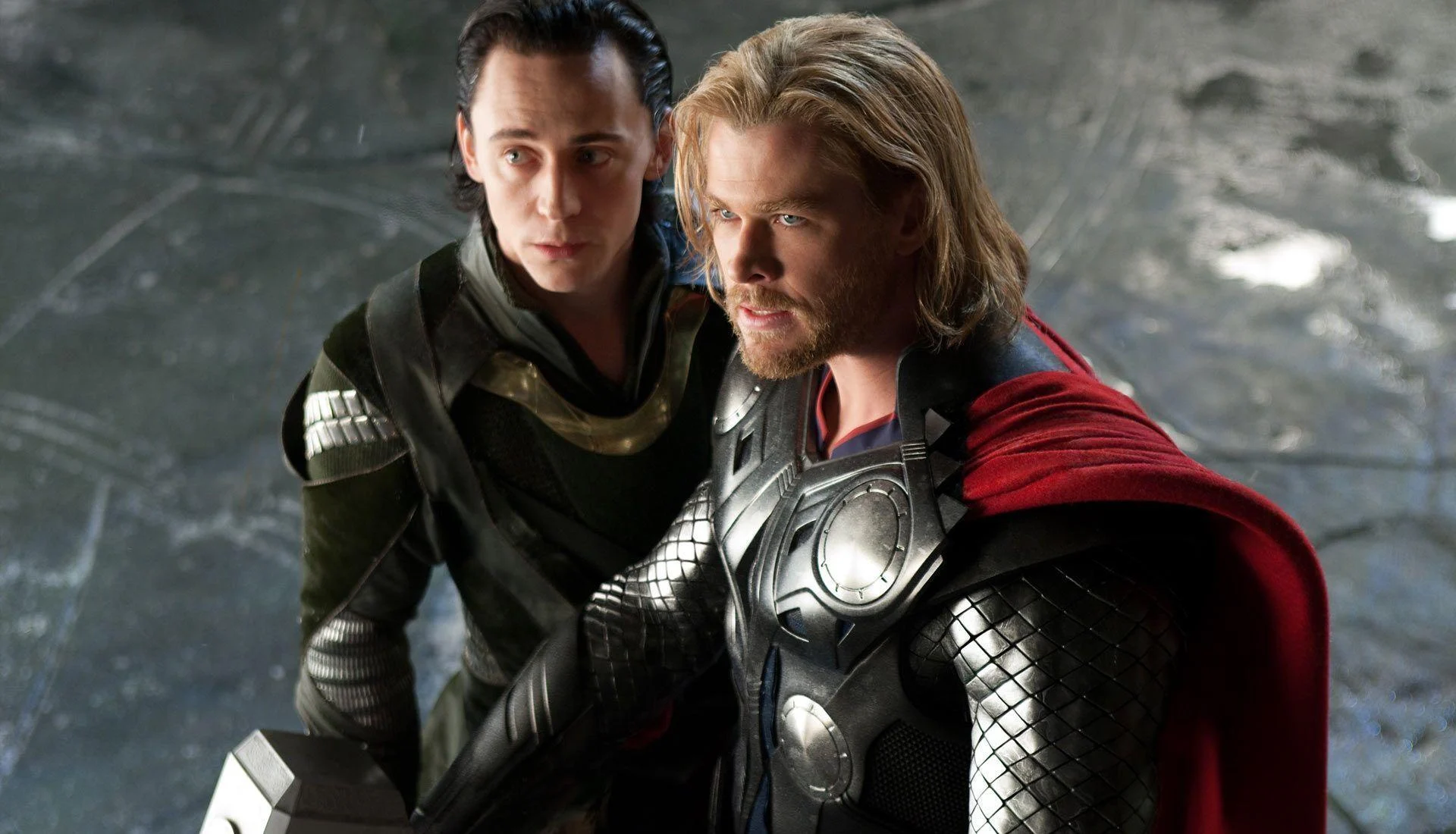 Tom Hiddleston (left) and Chris Hemsworth (right) as Loki and Thor in Thor (2011).