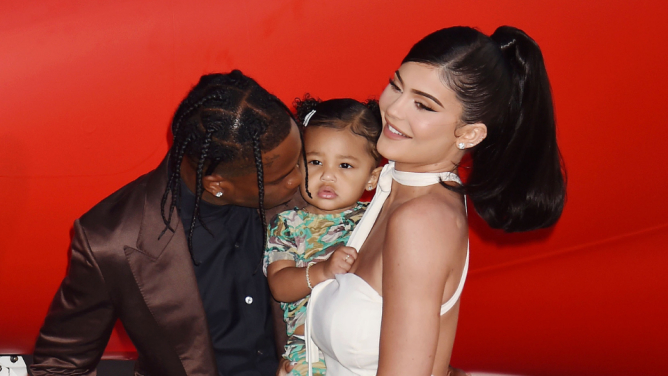 Kylie Jenner and Travis Scott with Stormi