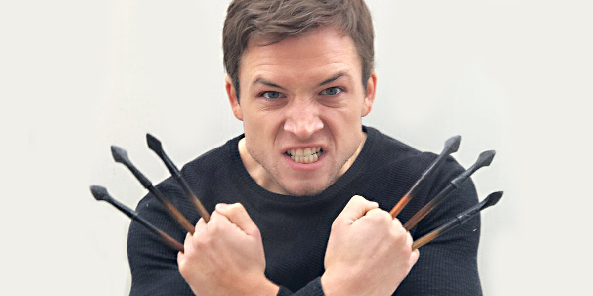 Taron Egerton posing as Wolverine