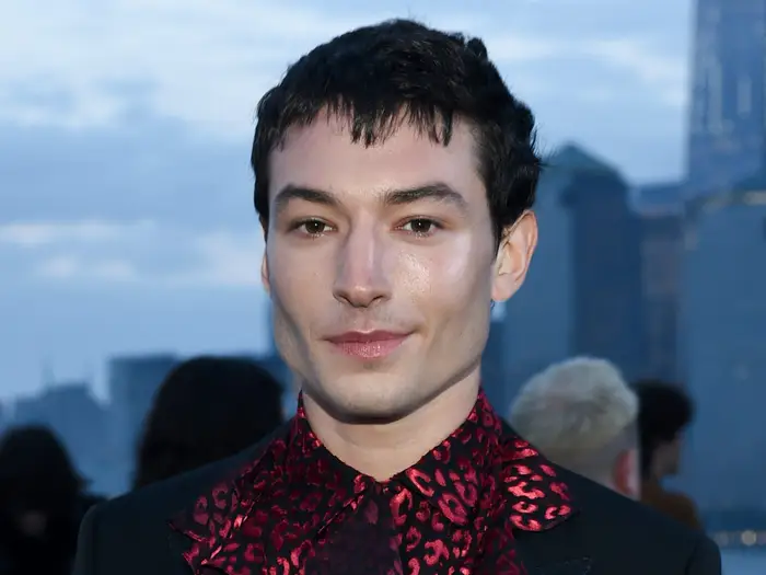 Ezra Miller smiling for the cameras.